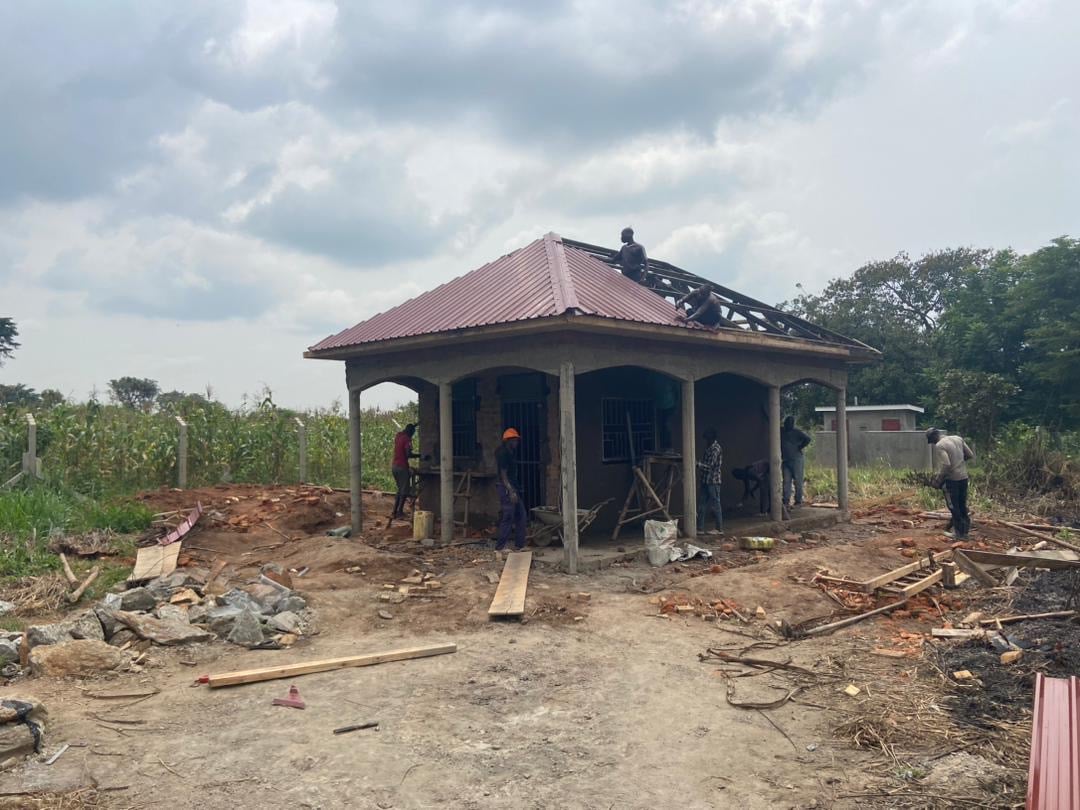 building under construction with workers
